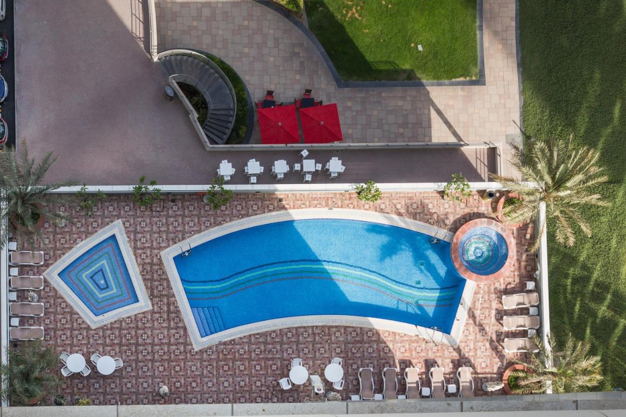 Higuests - Cozy Studio With Panoramic Views On The Lake Appartement Dubai Buitenkant foto