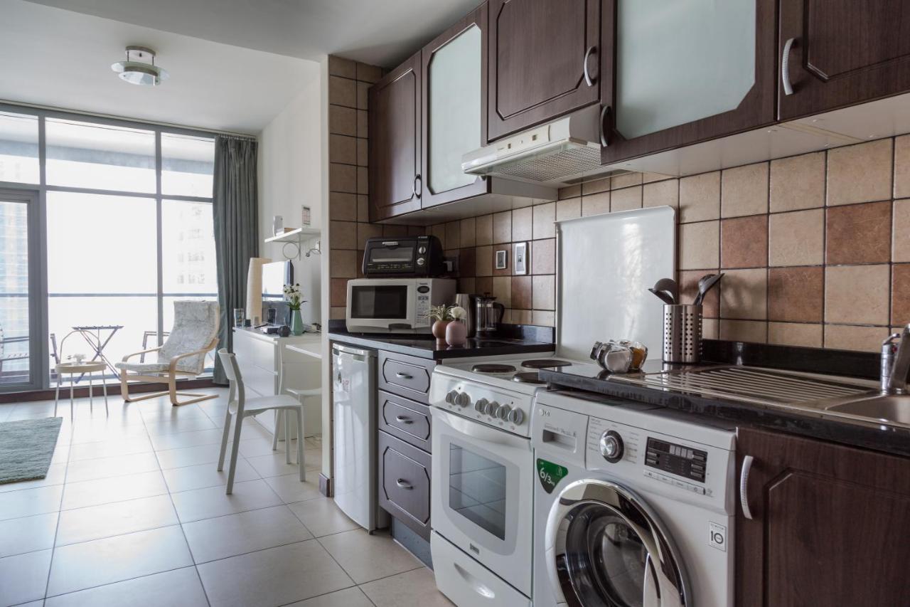 Higuests - Cozy Studio With Panoramic Views On The Lake Appartement Dubai Buitenkant foto